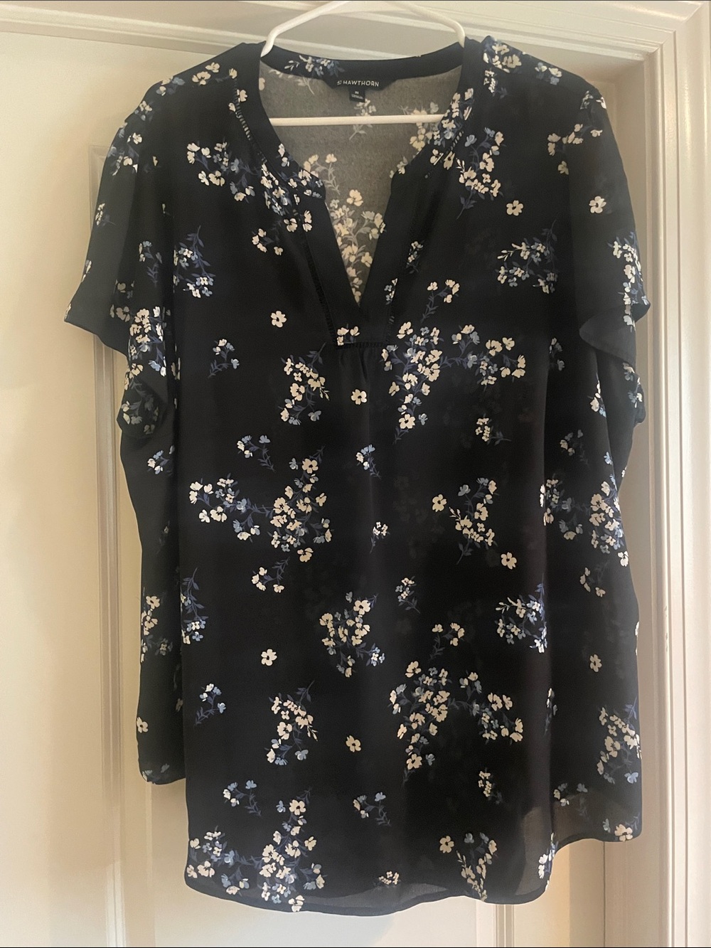 41 Hawthorn Black Floral Split V-Neck Blouse with White and Blue Blossoms